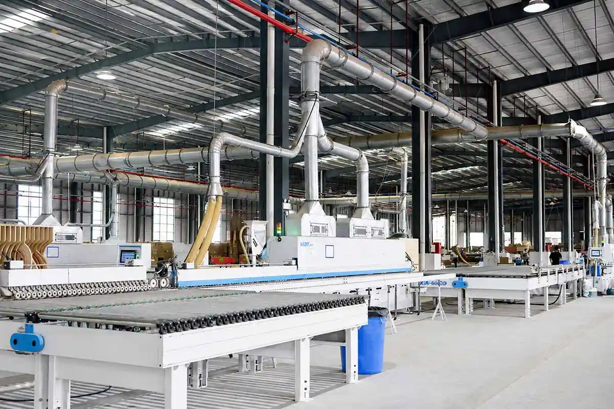 wood manufacturing workshop with panel processing equipment at onmuse